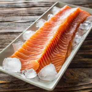 1kg of thin sliced, smoked salmon on ice